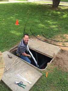 Man installing fiber