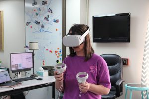 Student with Virtual Reality headset